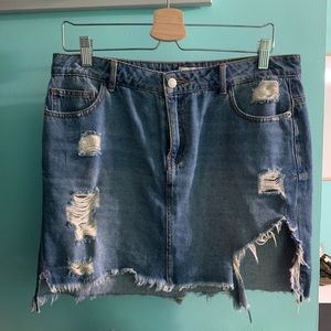distressed medium wash jean skirt
